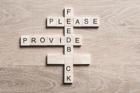 Conceptual media keywords on table with elements of game making crossword Foto stock