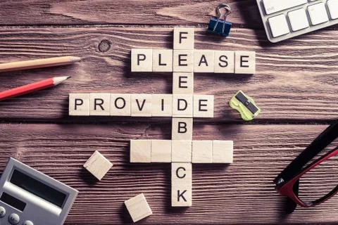 Conceptual media keywords on table with elements of game making Stock Photos