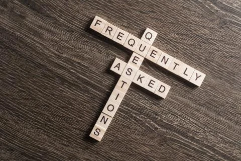 Conceptual media keywords on table with elements of game making crossword Stock Photos