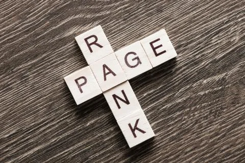 Conceptual media keywords on table with elements of game making crossword Foto stock