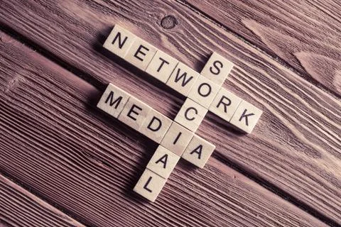 Conceptual media keywords on table with elements of game making Foto stock