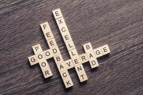 Conceptual media keywords on table with elements of game making Stock Photos