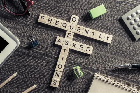 Conceptual media keywords on table with elements of game making crossword Stock Photos