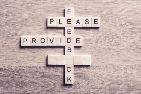 Conceptual media keywords on table with elements of game making crossword Stock Photos