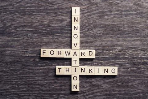 Conceptual media keywords on table with elements of game making crossword Stock Photos