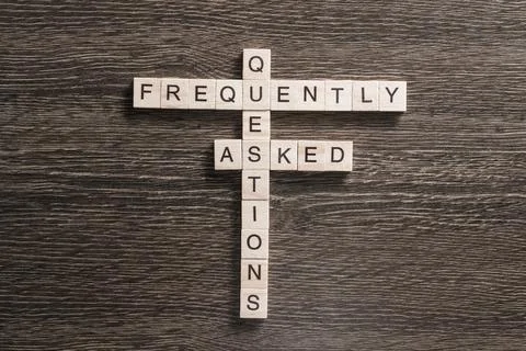 Conceptual media keywords on table with elements of game making crossword Stock Photos