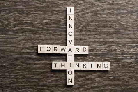 Conceptual media keywords on table with elements of game making crossword ... Foto stock