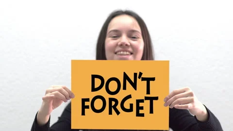 Conceptual message "Do Not Forgive" on canvas frame label hold by beautiful g Stock Footage 146995620