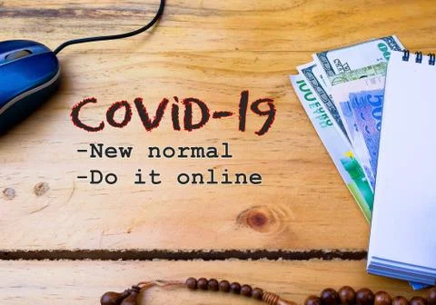 Conceptual of new normal and do it online as lifestyle during Covid-19 lockdown. Stock Photos