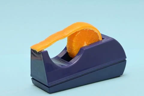 Conceptual Orage Fruit Slice Adhesive Tape Dispenser Stock Photos