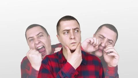 Conceptual photo. A man is experiencing an attack of schizophrenia, it seems to  Stock Footage 154636852