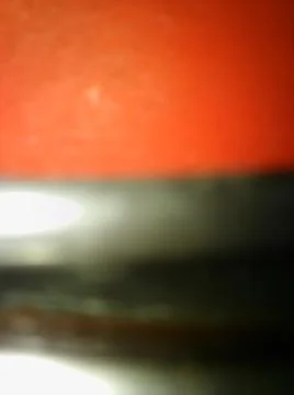 Conceptual red plastic texture with different elements. Background with abstr Stock Photos