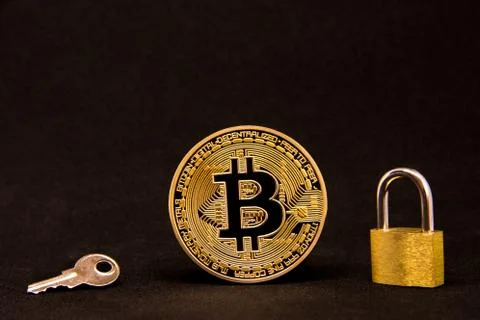 Conceptual representation of the safety or security of bitcoin on a dark back Stock Photos