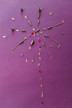 Conceptual set of tools on purple background. It looks like salut. Working ha Stock Photos