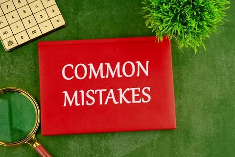 Conceptual symbol. Copy space. Common mistakes words written on a red busin.. Stock Photos