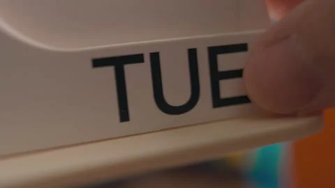 Conceptual Time Lapse of Weekly Calendar Days Changing by Hand Stock Footage 331915102