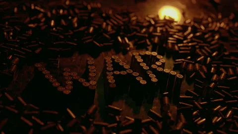 Conceptual video showing the word war made from bullets falling Stock Footage 342744690