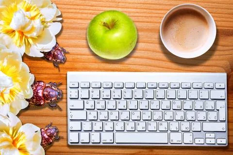 Conceptual view of computer bugs on striped wooden desk Stock Photos