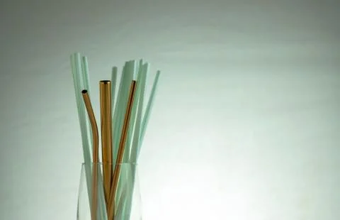 Conceptual of world issue on single use plastic against reusable steel straw. Stock Photos