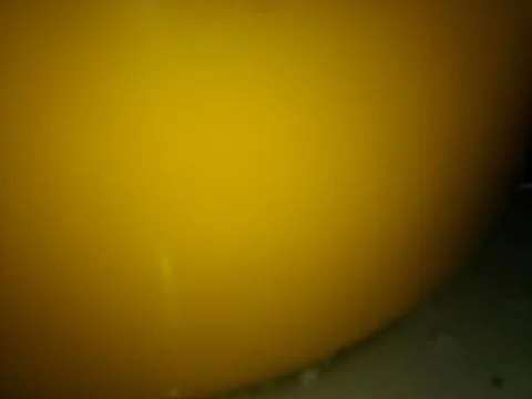 Conceptual yellow plastic texture with different elements. Background with ab Foto stock