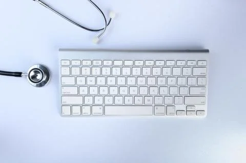Conceptual,stethoscope on a white table Фото
