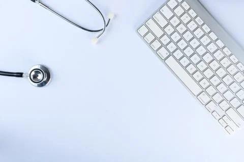 Conceptual,stethoscope on a white table Stock Photos