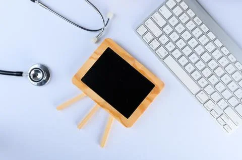 Conceptual,stethoscope on a white table Фото