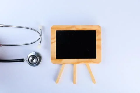 Conceptual,stethoscope on a white table Stock Photos