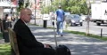 Concerned Businessman Meeting Delegation Travel Sidewalk Bench Sitting Wait Cab 4k or 4k+ Resolution