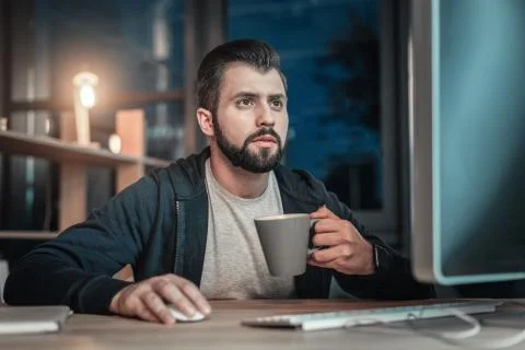 Concerned IT guy coding 写真素材