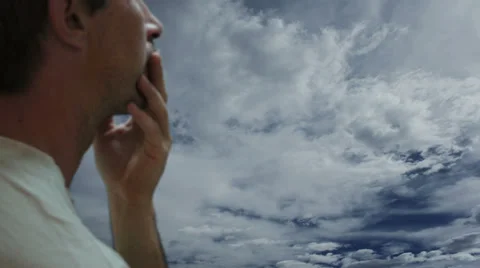 Concerned Man Against Timelapse Clouds Video stock 38099323