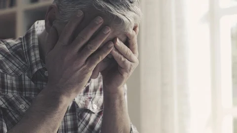Concerned man checking his home finances and debts Stock Footage 103203076