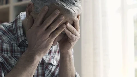 Concerned man checking his home finances and debts Stock Footage 103203128