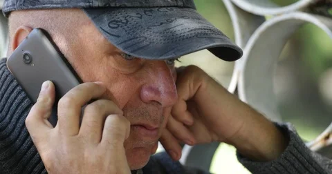 Concerned Man Talking to Mobile Depressed Person Trouble Pressure Alone Concept Stock Footage 75733039