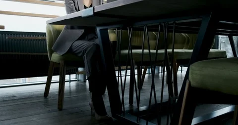 Concerned woman working on laptop computer and looking away thinking solving Видео 120507459