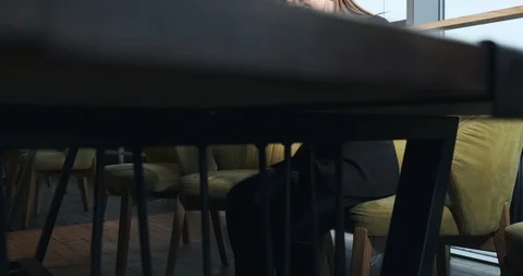Concerned woman working on laptop computer and looking away thinking solving Stock Footage 122262767