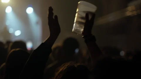 Concert Crowd Cheering with Cup in Hand Stock Footage 334481591