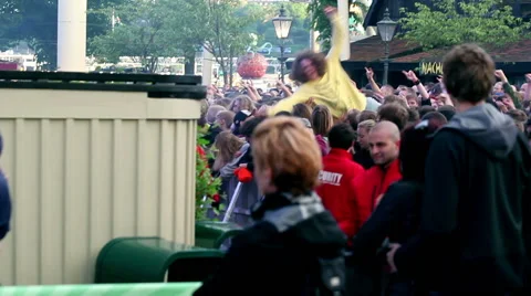 Concert crowd gone mad - Guards taking drunk fans out Stock Footage 45162627