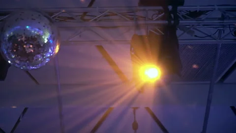 Concert light dynamic devices with disco balls Stockbeeldmateriaal 155939794