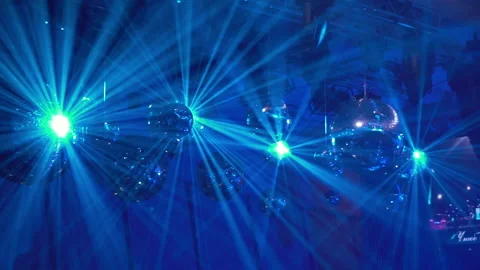 Concert light dynamic devices with disco balls Stockbeeldmateriaal 155940309