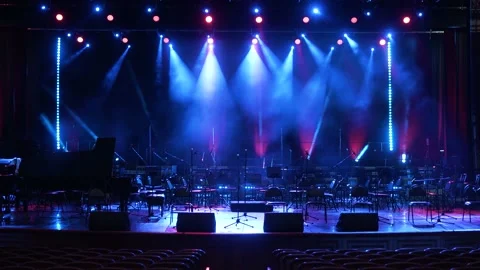 Concert light. Stage lighting background. A room and a stage without people. Stock Footage 221858623