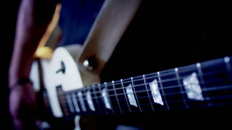 Concert rock band performing on stage with singer performer, guitar, drummer.  Stock Footage