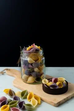 Conchiglie paste of different colors Stock Photos