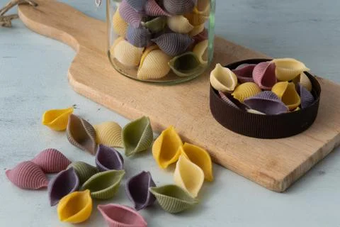 Conchiglie paste of different colors Stock Photos