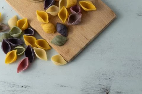 Conchiglie paste of different colors Stock Photos