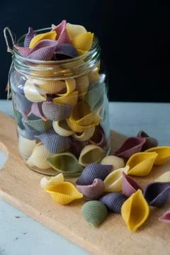 Conchiglie paste of different colors Stock Photos