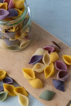 Conchiglie paste of different colors Stock Photos