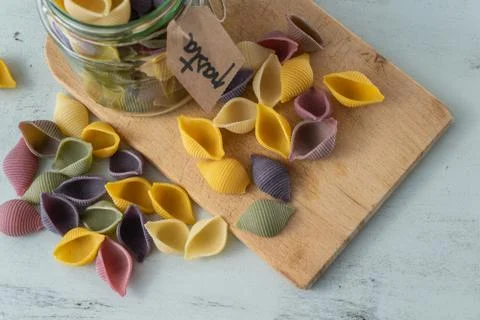 Conchiglie paste of different colors Stock Photos
