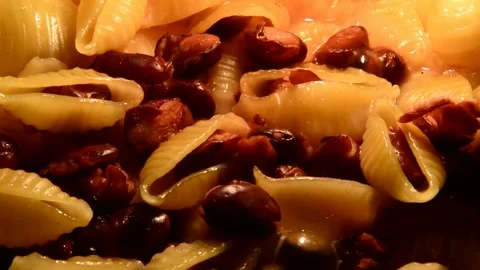 Conchiglie rigate pasta with red beans Stock Footage 321341482