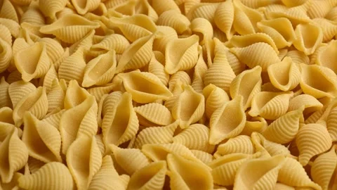 Conchiglie, Shells or Seashells Pasta Wallpaper. Spiral Raw Macaroni 動画素材 211833385